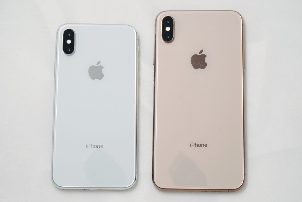 Apple's iPhone X next to the Apple iPhone XS Max