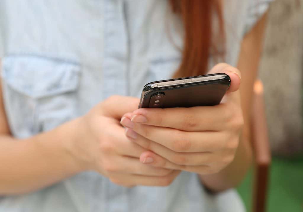 Using a smartphone, iPhone X,