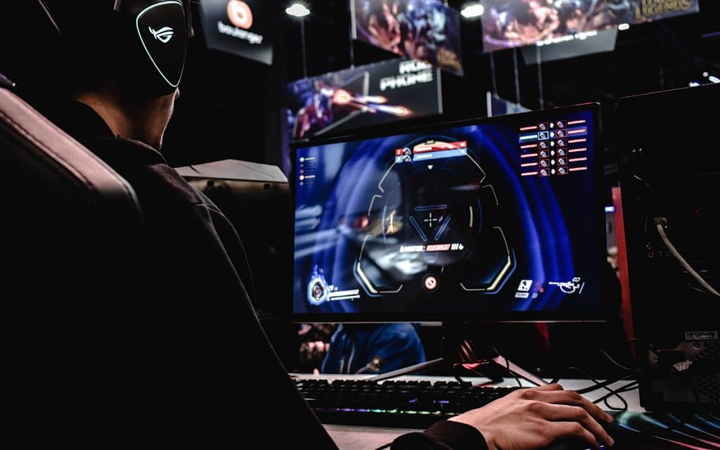 A gamer playing on a gaming PC