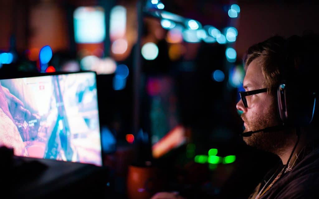 A gamer with a gaming PC