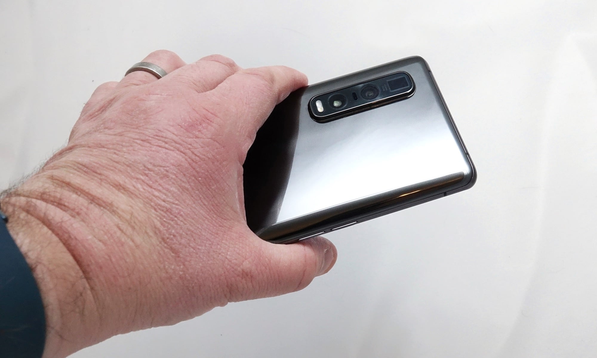 Holding the Oppo Find X2 Pro