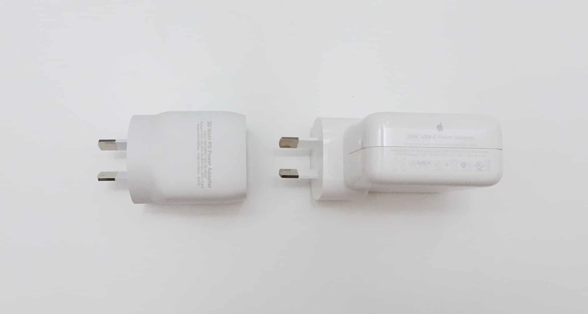 Belkin 30W GaN Boost charge pack (left) vs Apple 30W MacBook Air charge pack (right)
