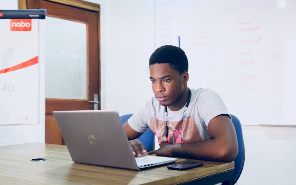 A young person coding