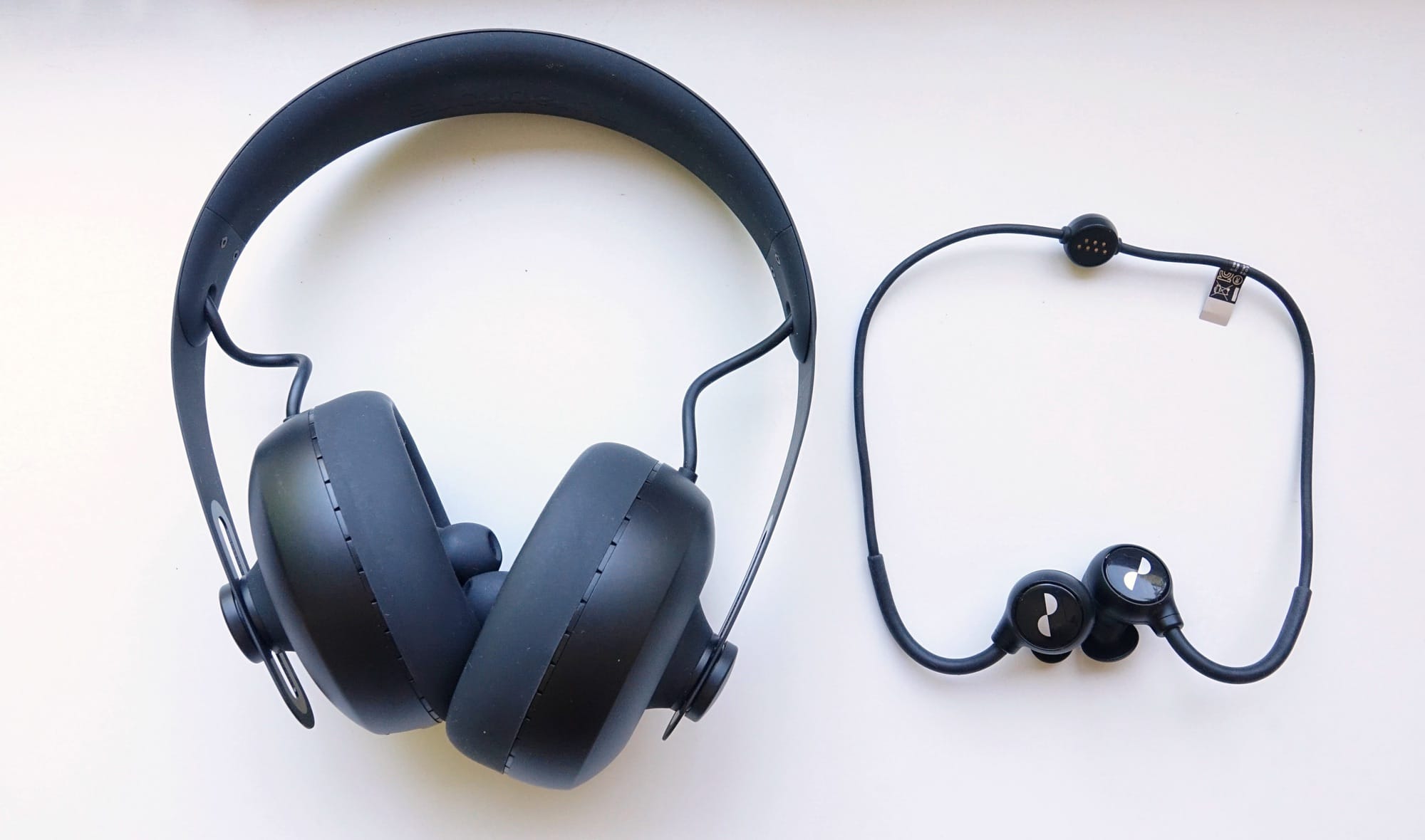 The original Nuraphones (left) next to the Nuraloop (right).
