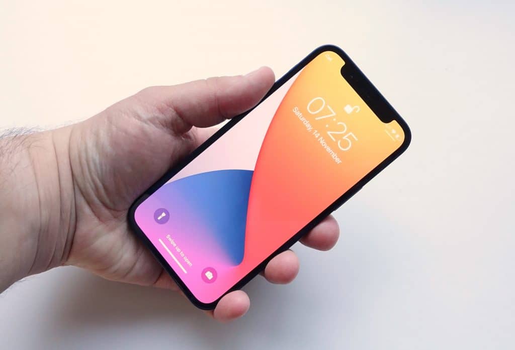 Holding the iPhone 12 Mini