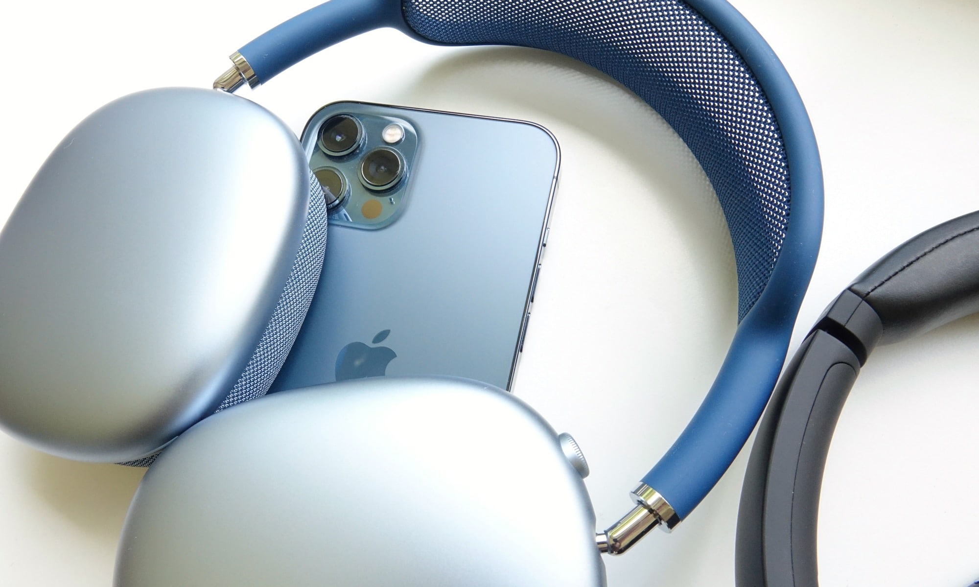 Apple AirPods Max on top of an iPhone 12 Pro Max