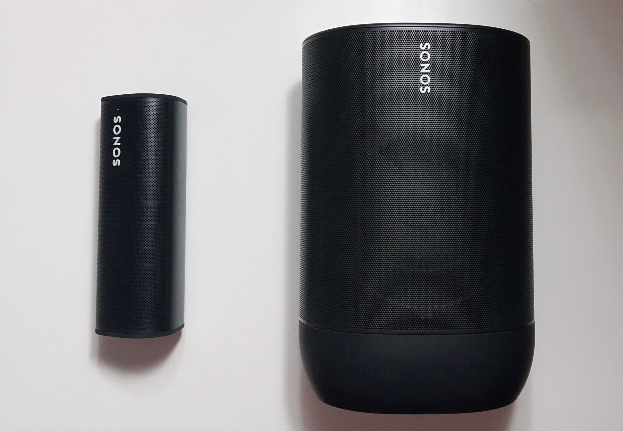 Sonos Roam (left) next to the Sonos Move (right)