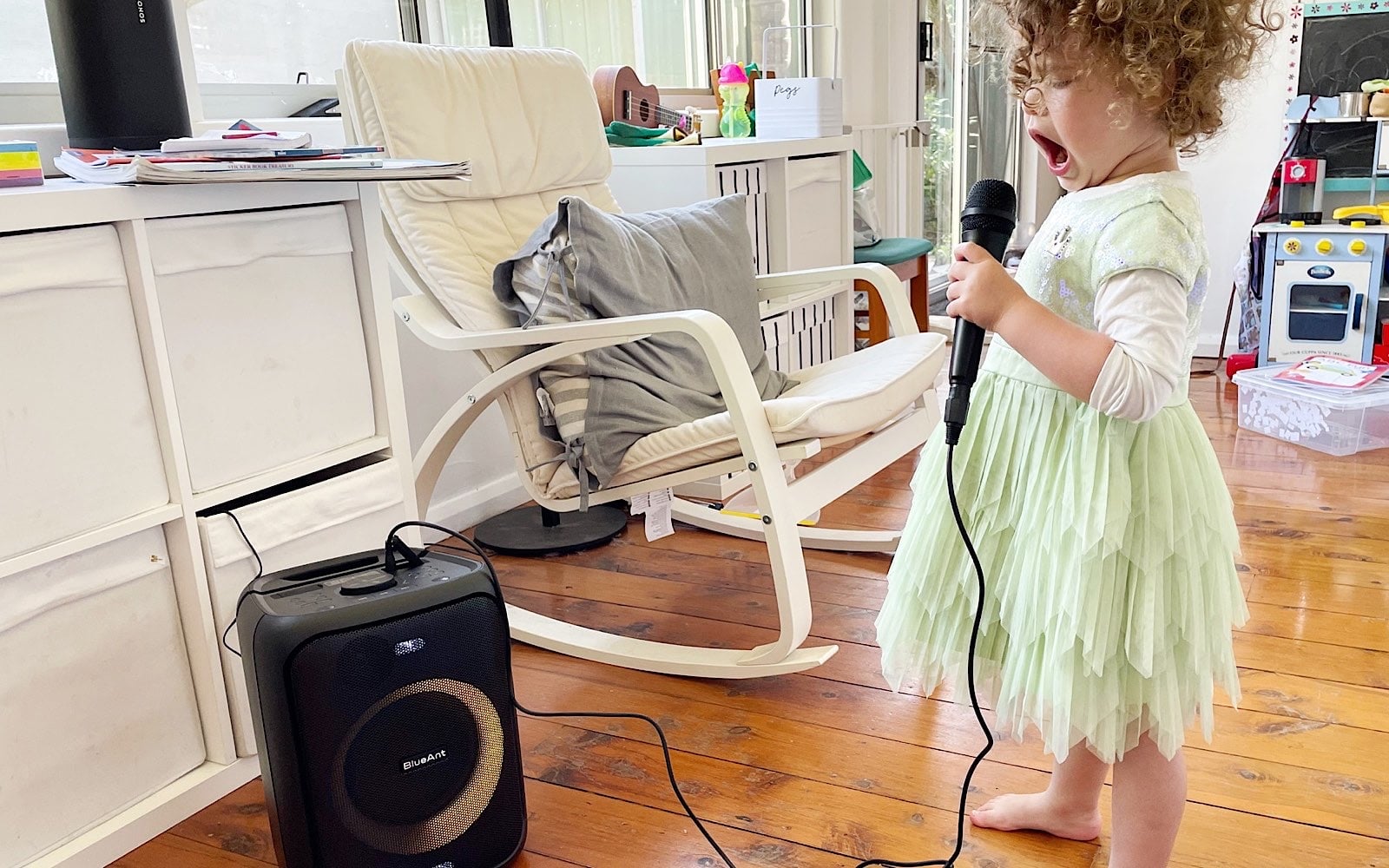 Emma singing with the BlueAnt X5 speaker